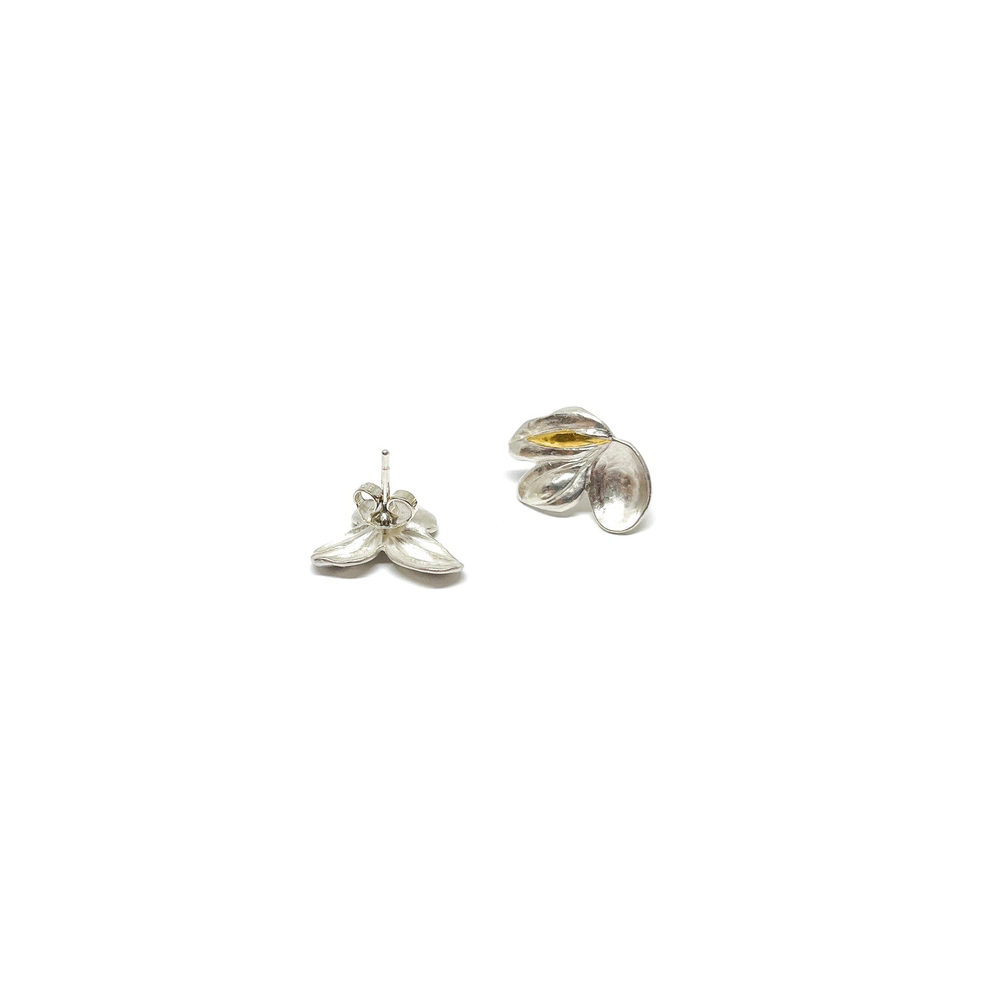 Two textured sterling silver stud earrings with abstract floral or leaf-like shapes and Keum-Boo gold detailing. One shows the post.