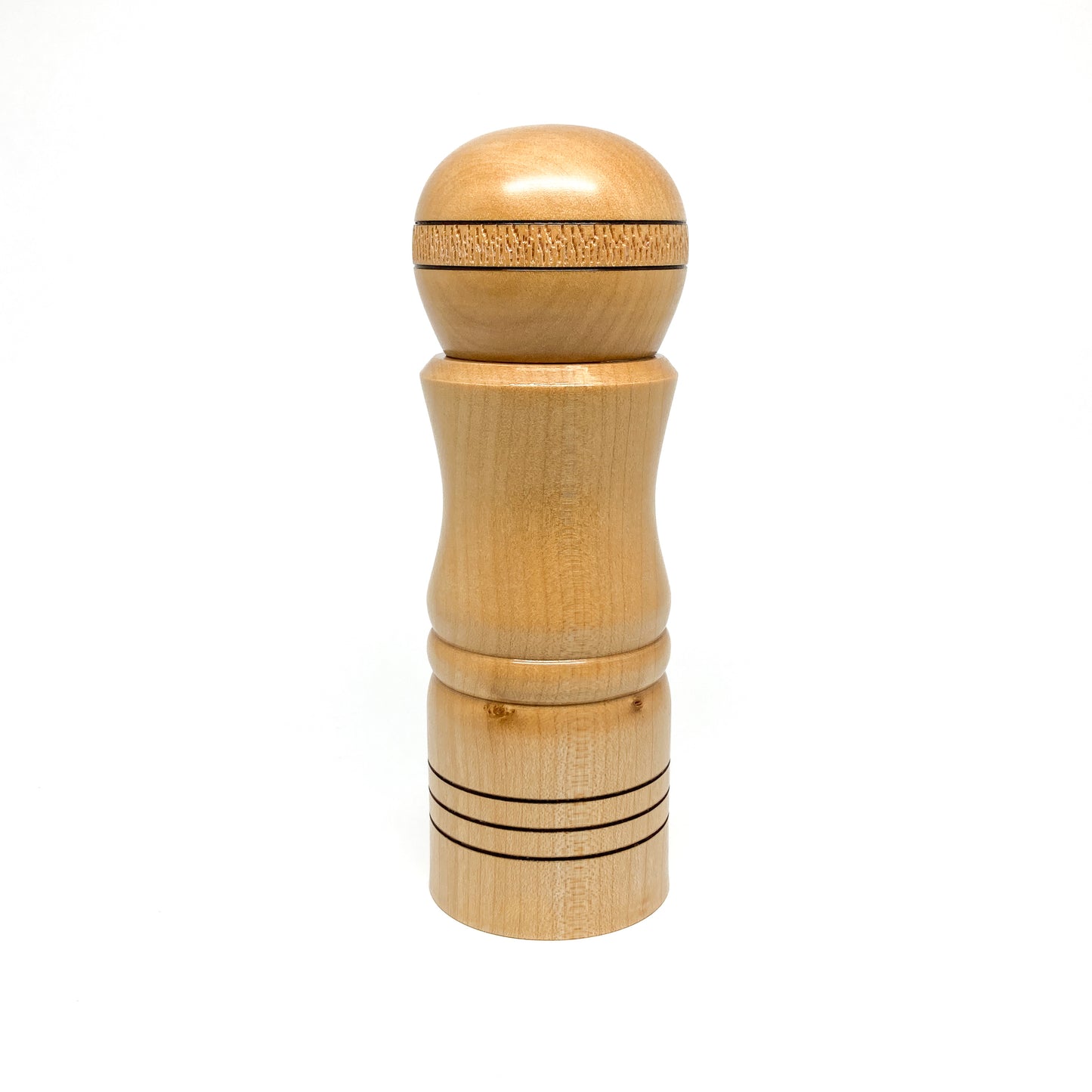 Wooden pepper mill, light wood, with decorative rings.