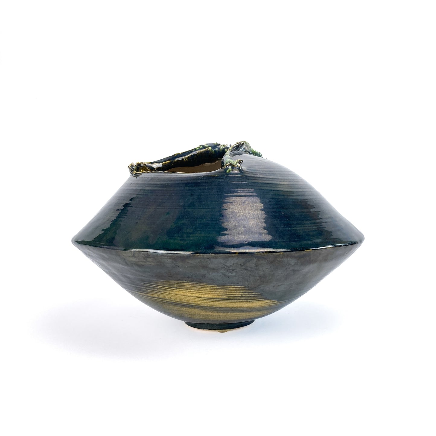 A dark, conical ceramic UFO vessel with a textured, organic rim and subtle horizontal striations in its glaze.