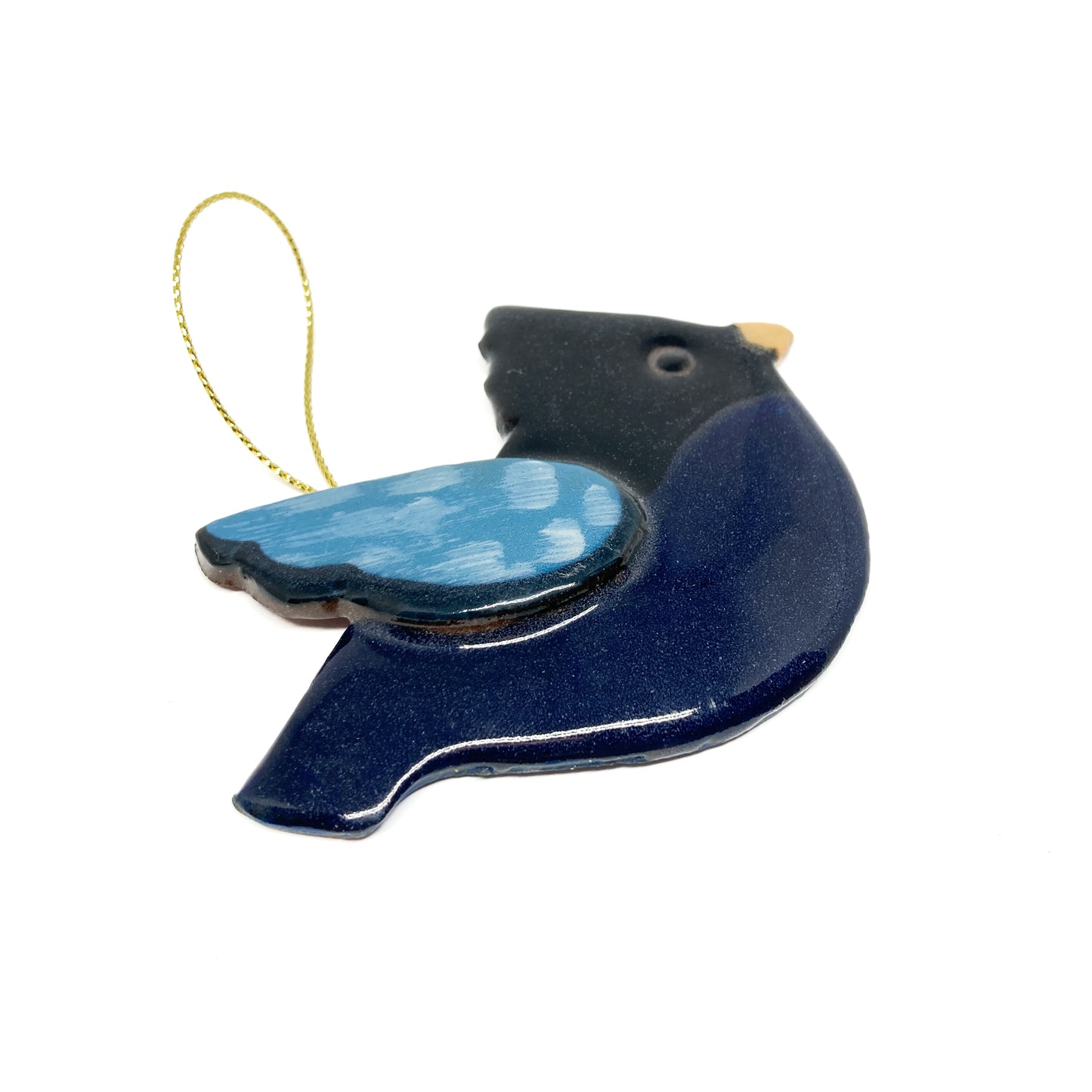 One dark bird ornament with light blue wings and gold strings.