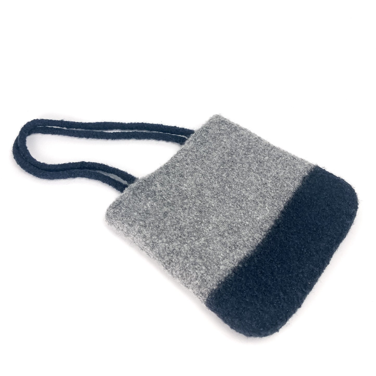 Two-tone felted tablet tote bag with two thick, looped handles. The lower portion is a darker shade.