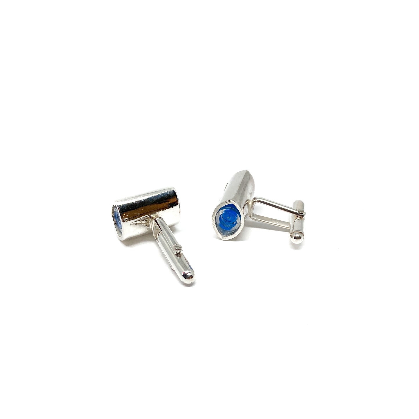 A pair of silver-toned cufflinks, each featuring a miniature spirit level with blue liquid and an air bubble.