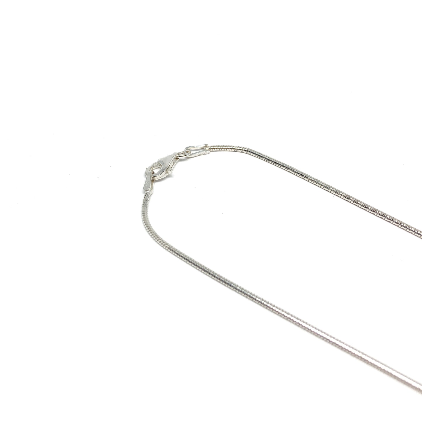 A close-up shows the lobster clasp and smooth, rounded links of a silver snake chain.