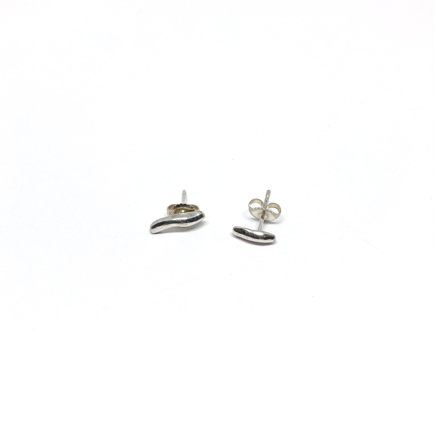 Silver organic stud earrings.
