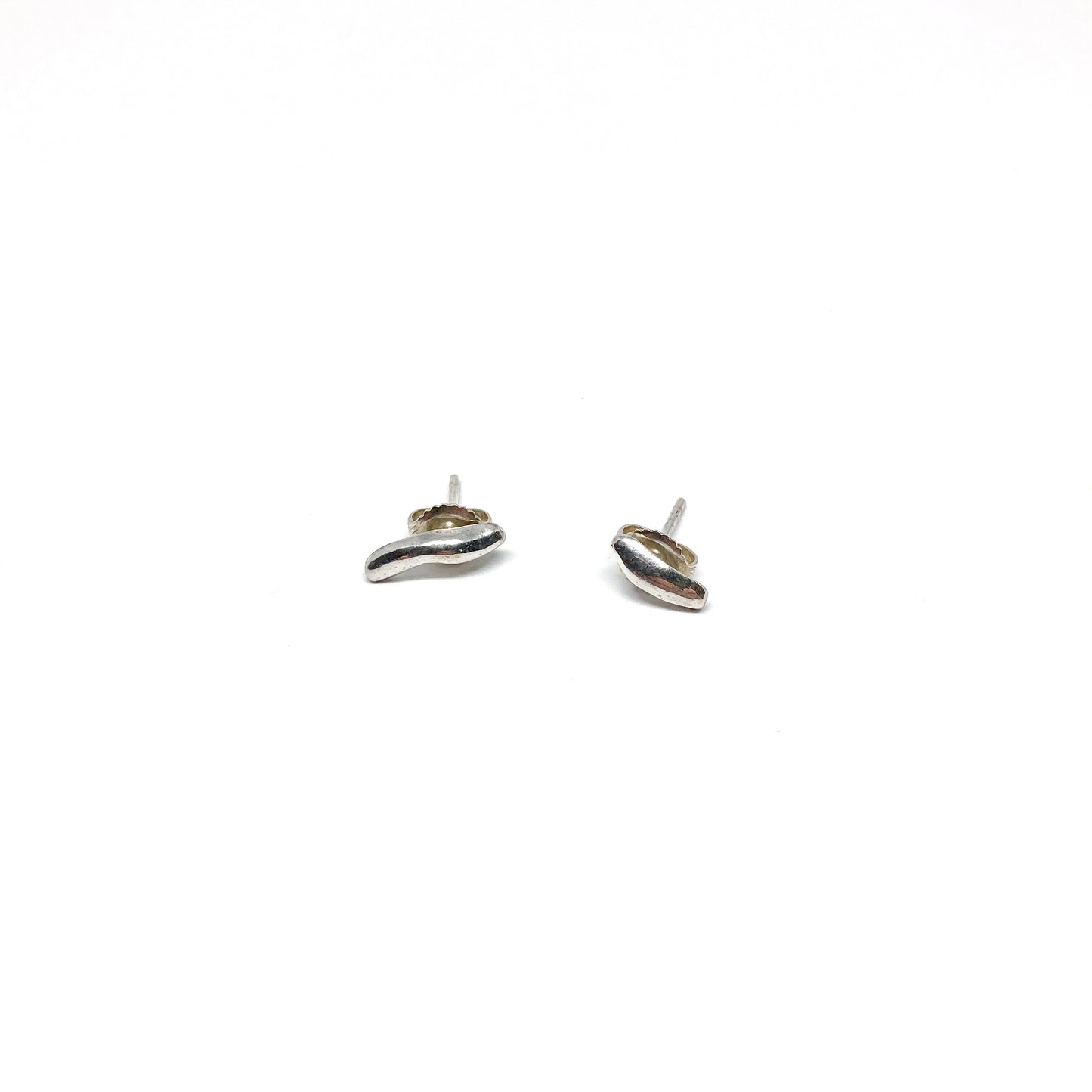 Silver organic stud earrings.