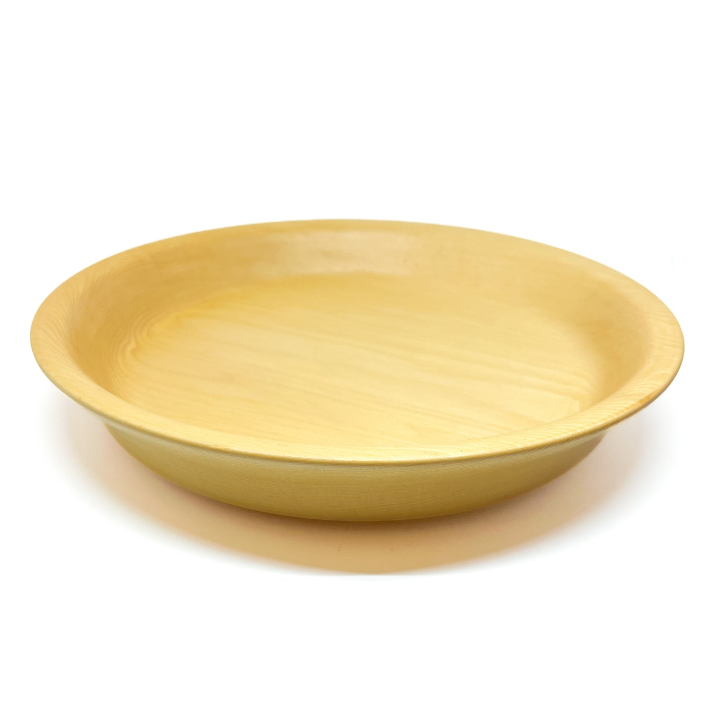 A yellow cedar serving tray, viewed from a slight angle.