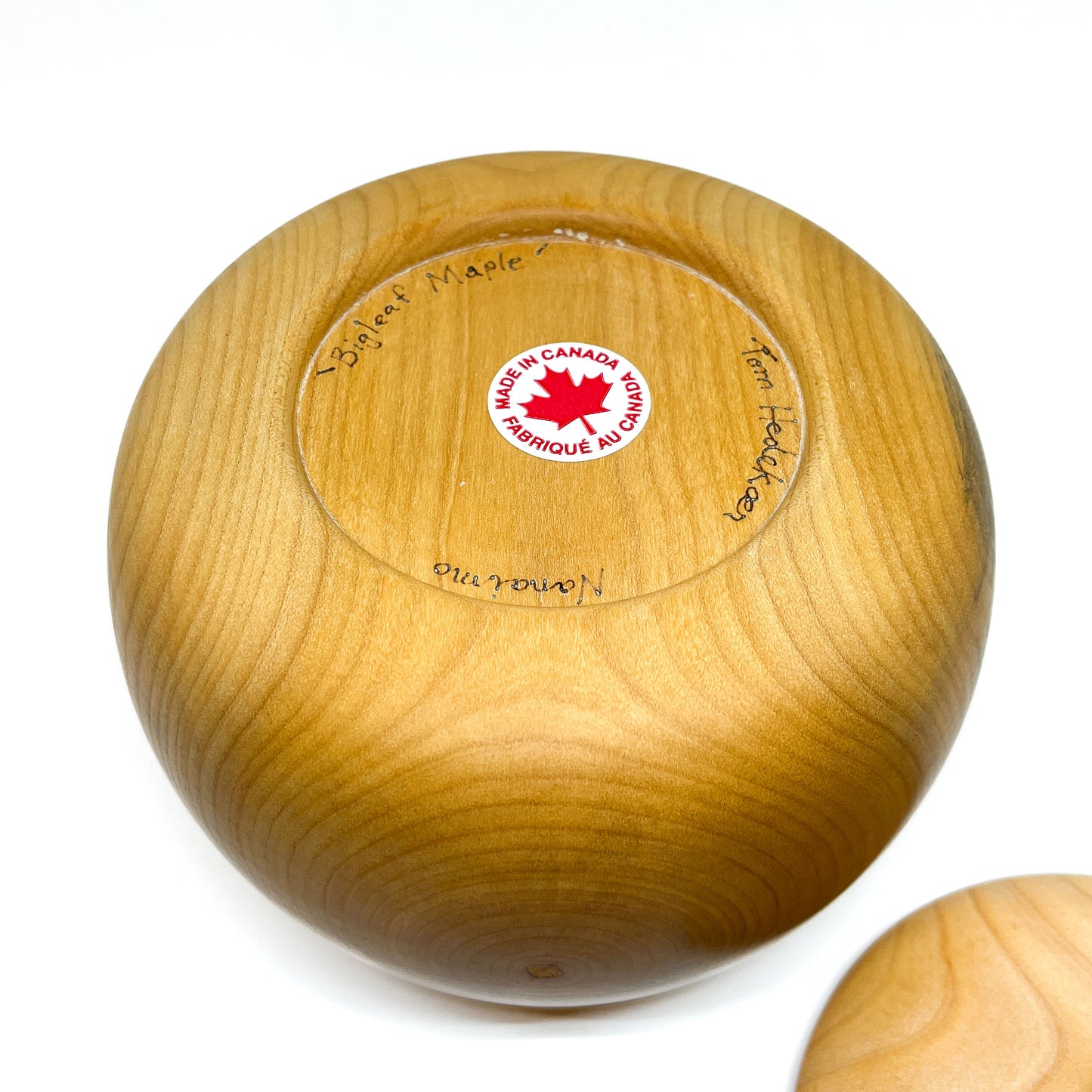 Bottom of the Lidded Big Leaf Maple Pot, revealing "Made in Canada" and maker's mark.