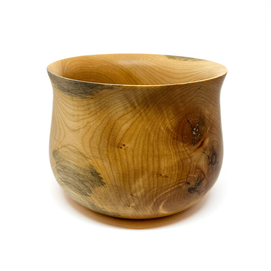 A wide Big Leaf Maple vase, showcasing its natural wood grain and subtle imperfections.