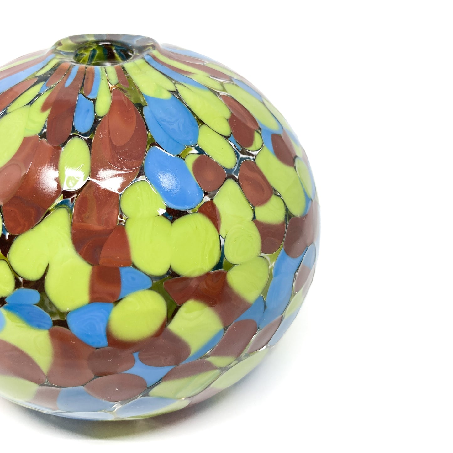 Side detail of the Swamp Monster Round Vase showing layered texture and pattern.