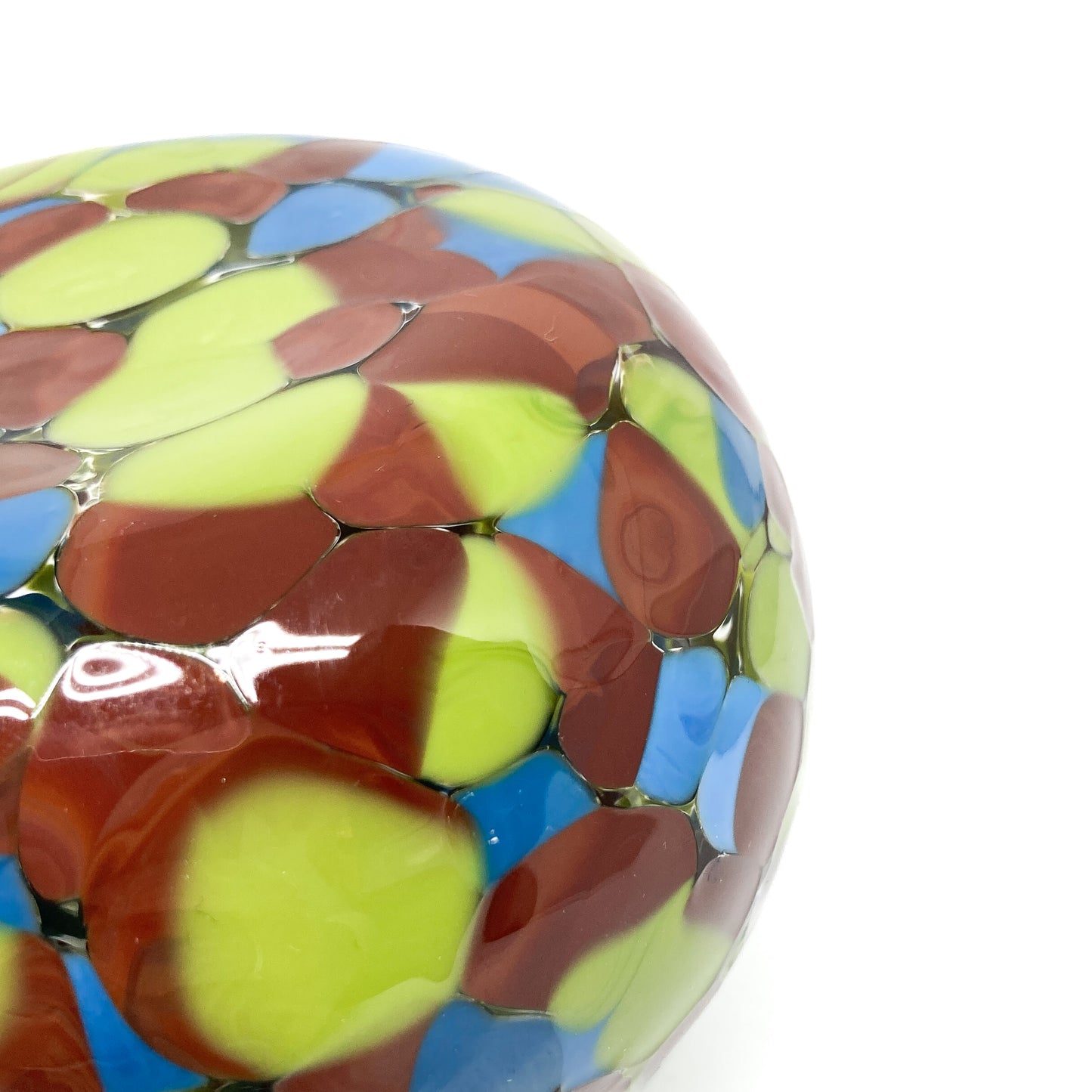 Close-up of the Swamp Monster Round Vase highlighting the organic, clustered glass motif.