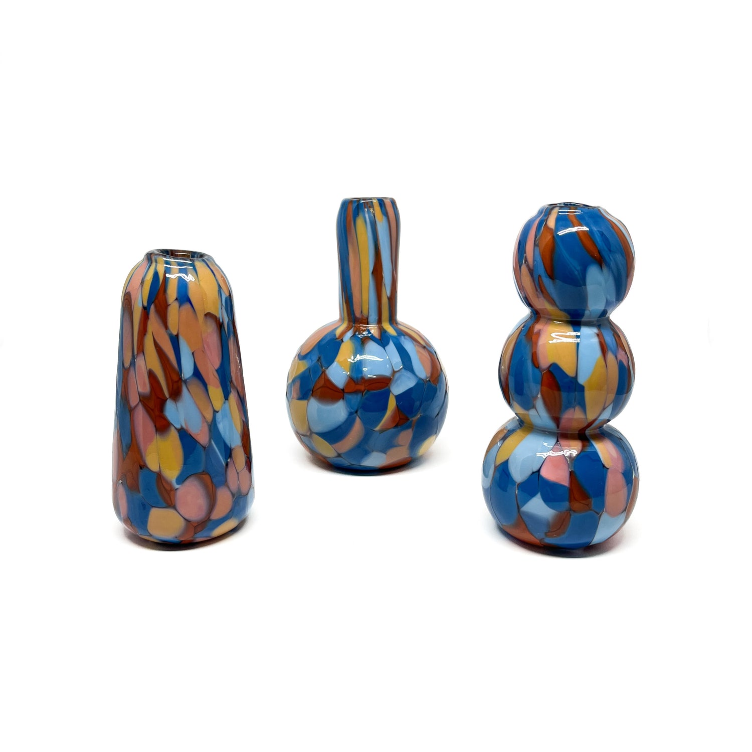 Set of three Blue & Orange Mini Vases with distinct shapes and a dynamic marbled glass pattern.
