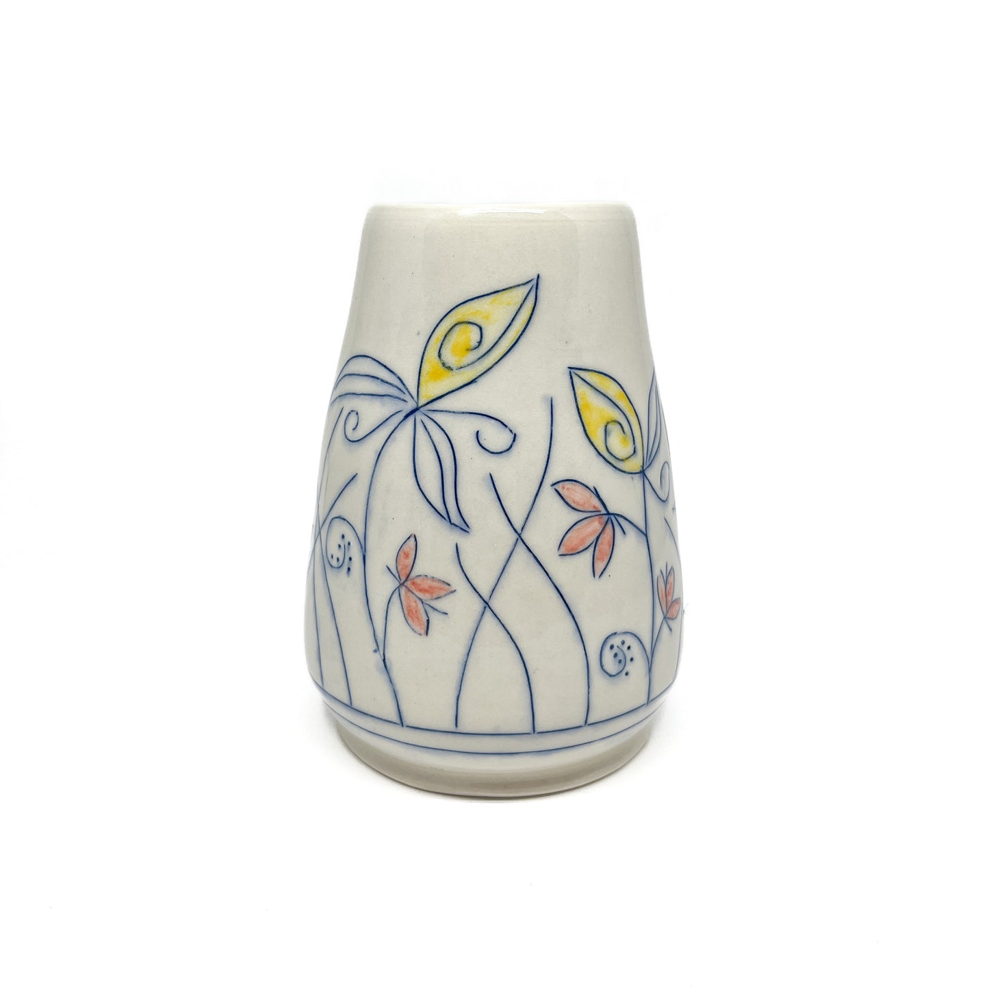 A white ceramic vase with a flared shape features hand-painted blue outlines of flowers and stems with yellow and reddish-orange petal details. The inner glaze is light brown.
