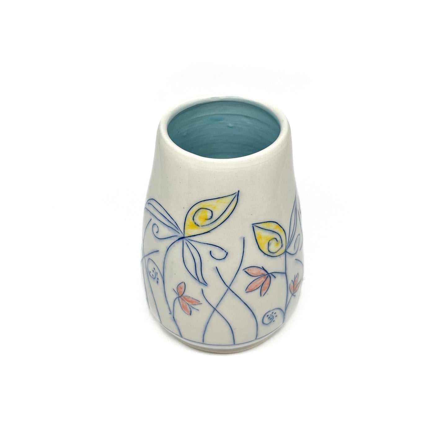 A white ceramic vase with a light blue inner glaze is decorated with blue outlined flowers and stems with yellow and reddish-orange petal accents.
