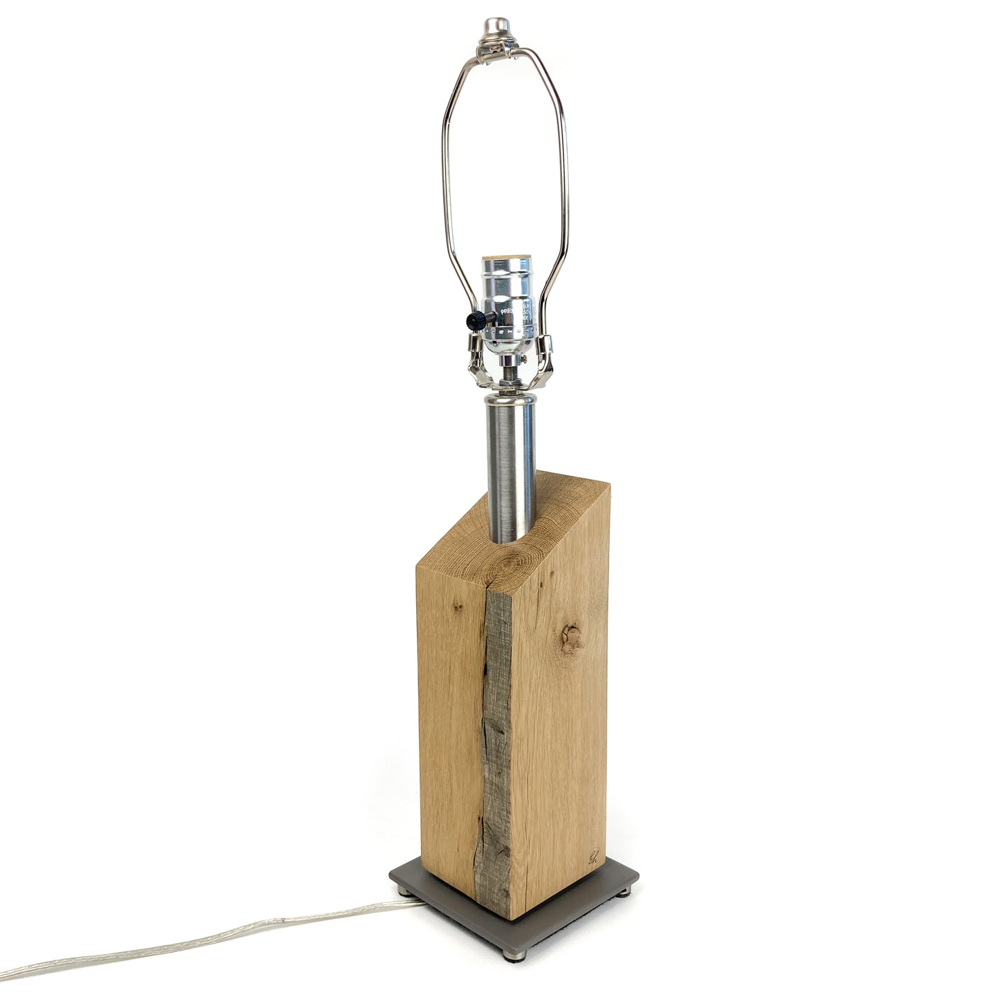 Lamp base (wood) with visible harp, no shade.
