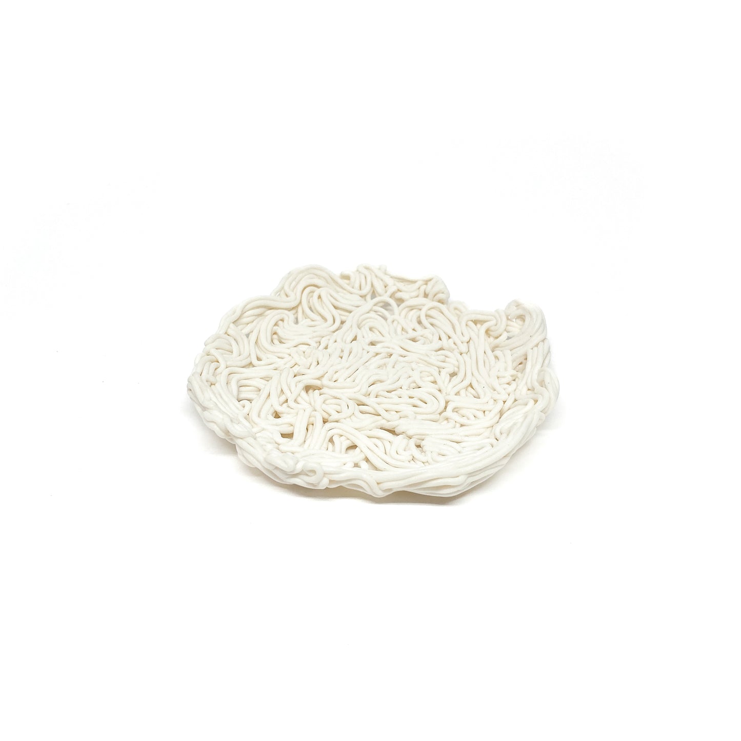 A textured, shallow, round spiral tealight holder made of ceramic with a dense, noodle-like pattern.