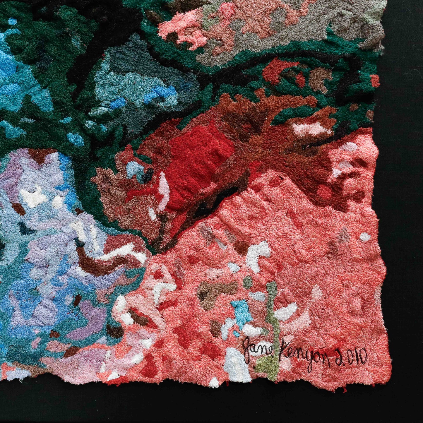 Detailed thread painting close-up, showcasing colorful thread stitching. Artist signature "Jane Kenyon 2010" visible.