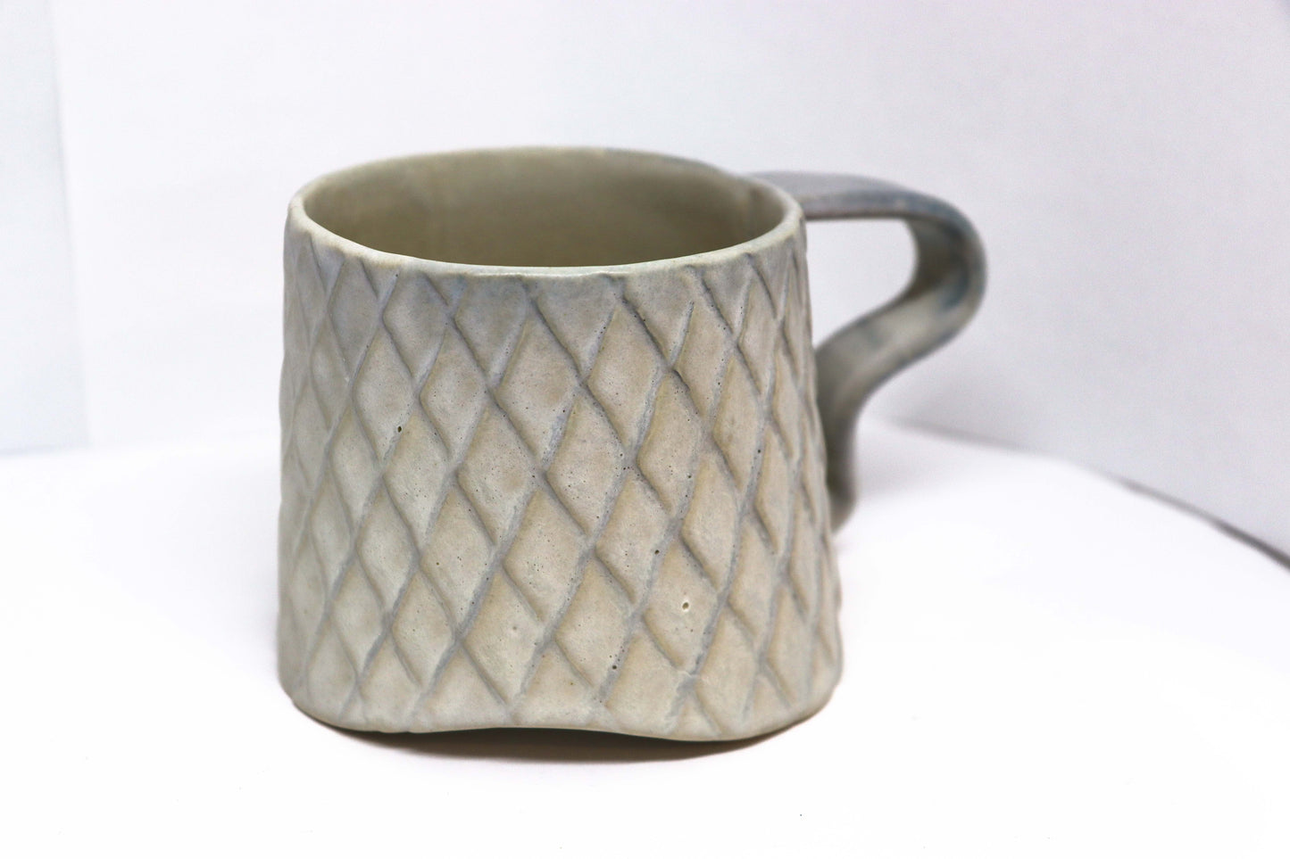 Carved Mug with Squiggle Handle
