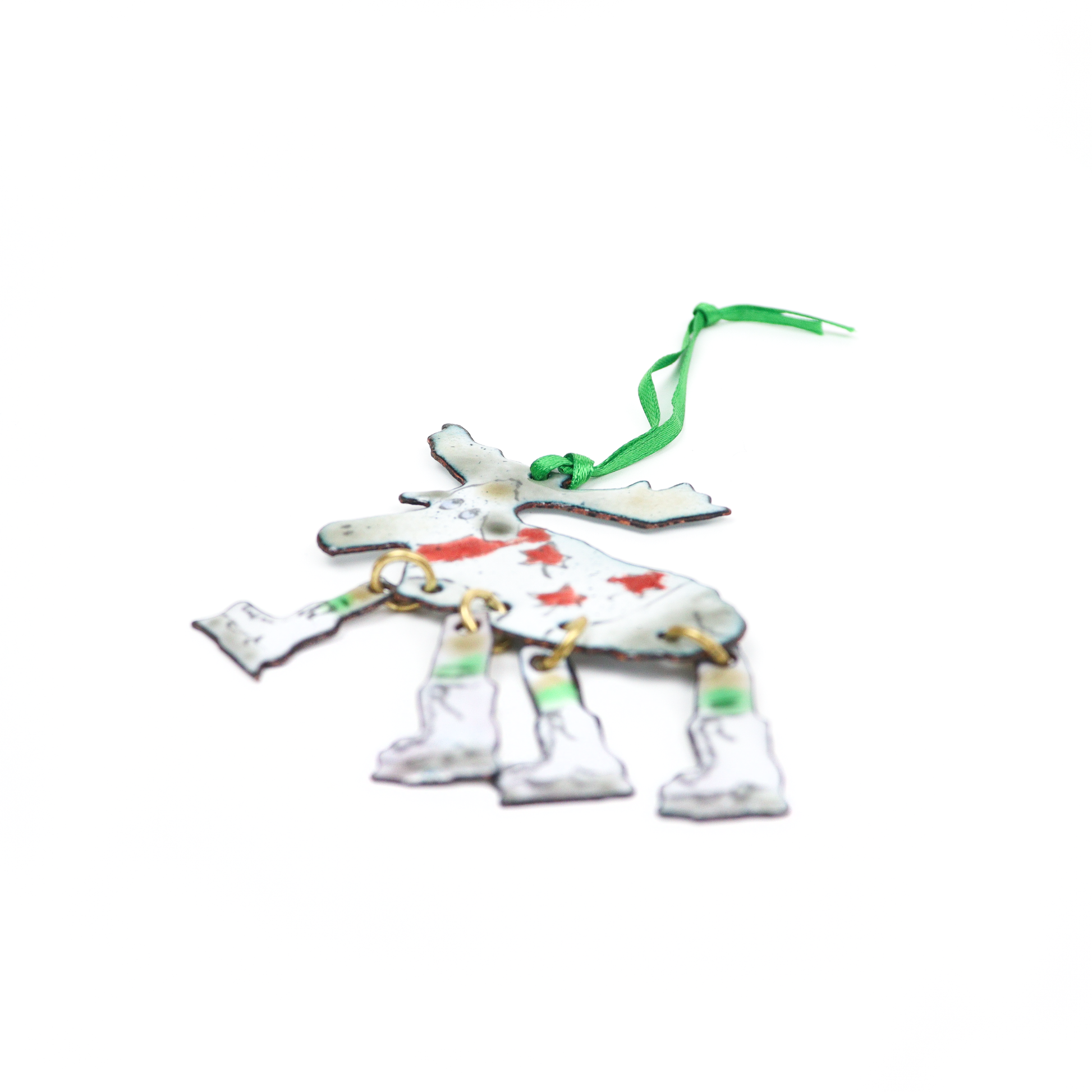 Side view of Skating Moose Ornament featuring movable skating legs and red star decorations on the body