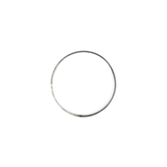 A circular, metallic bangle.