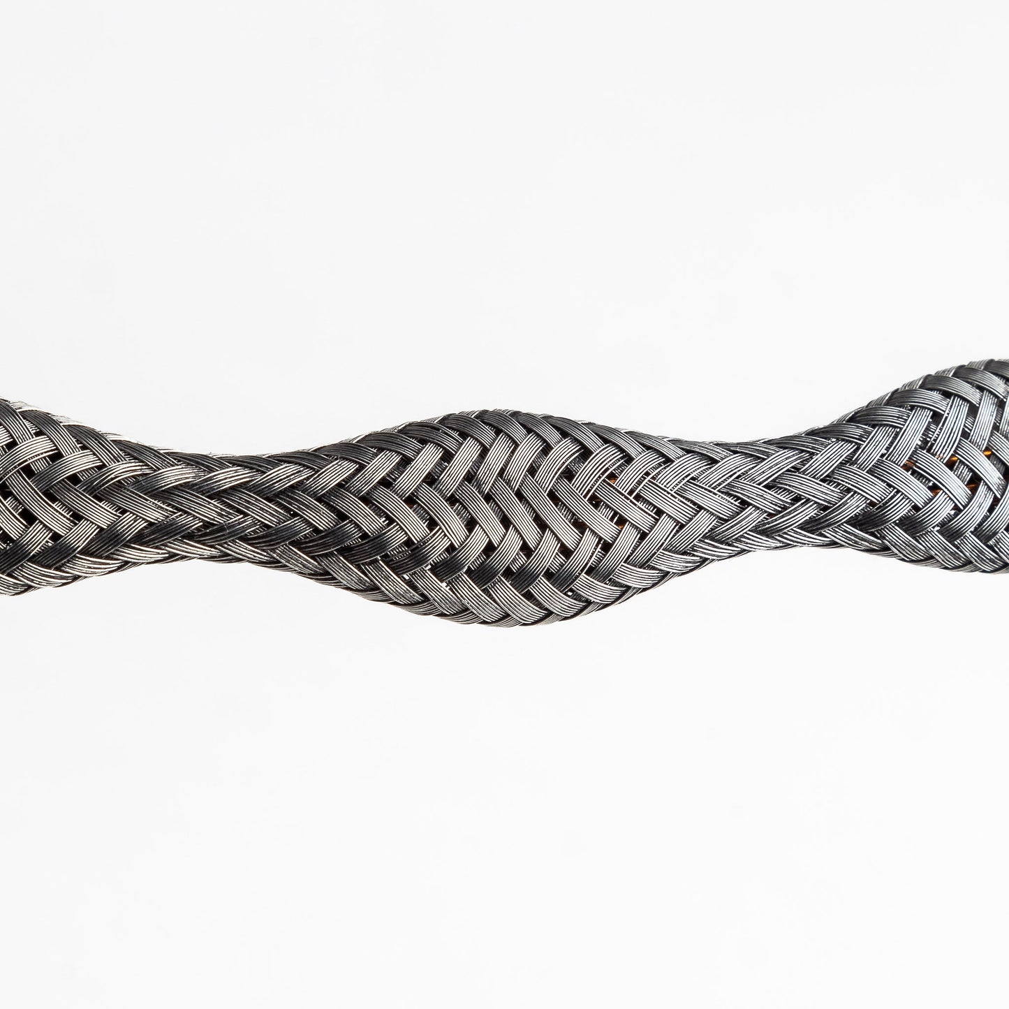 Close-up of a braided stainless steel necklace section, slightly curved, on a white background.