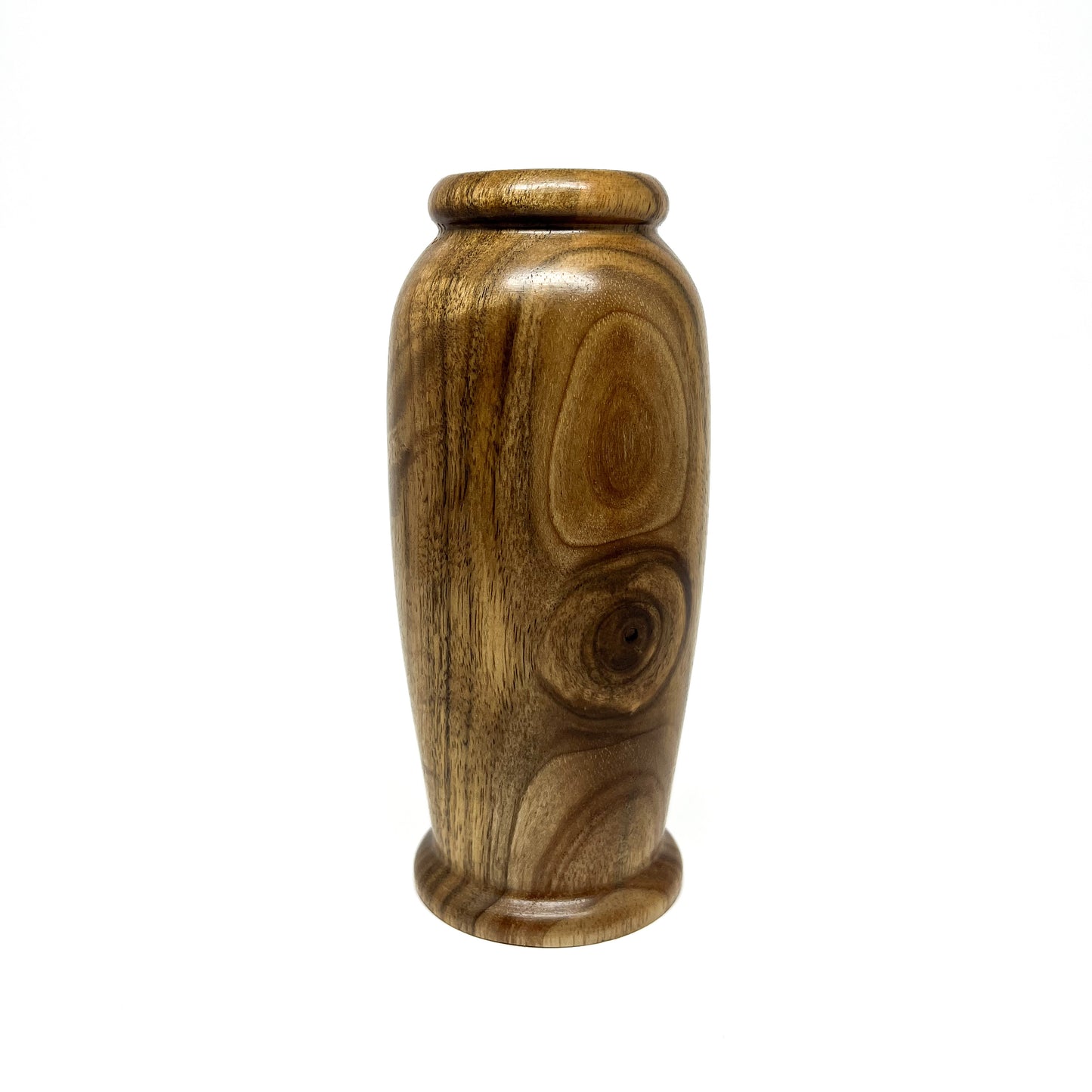Small wooden hollowform vase with distinct natural wood grain patterns and a rounded base and rim.