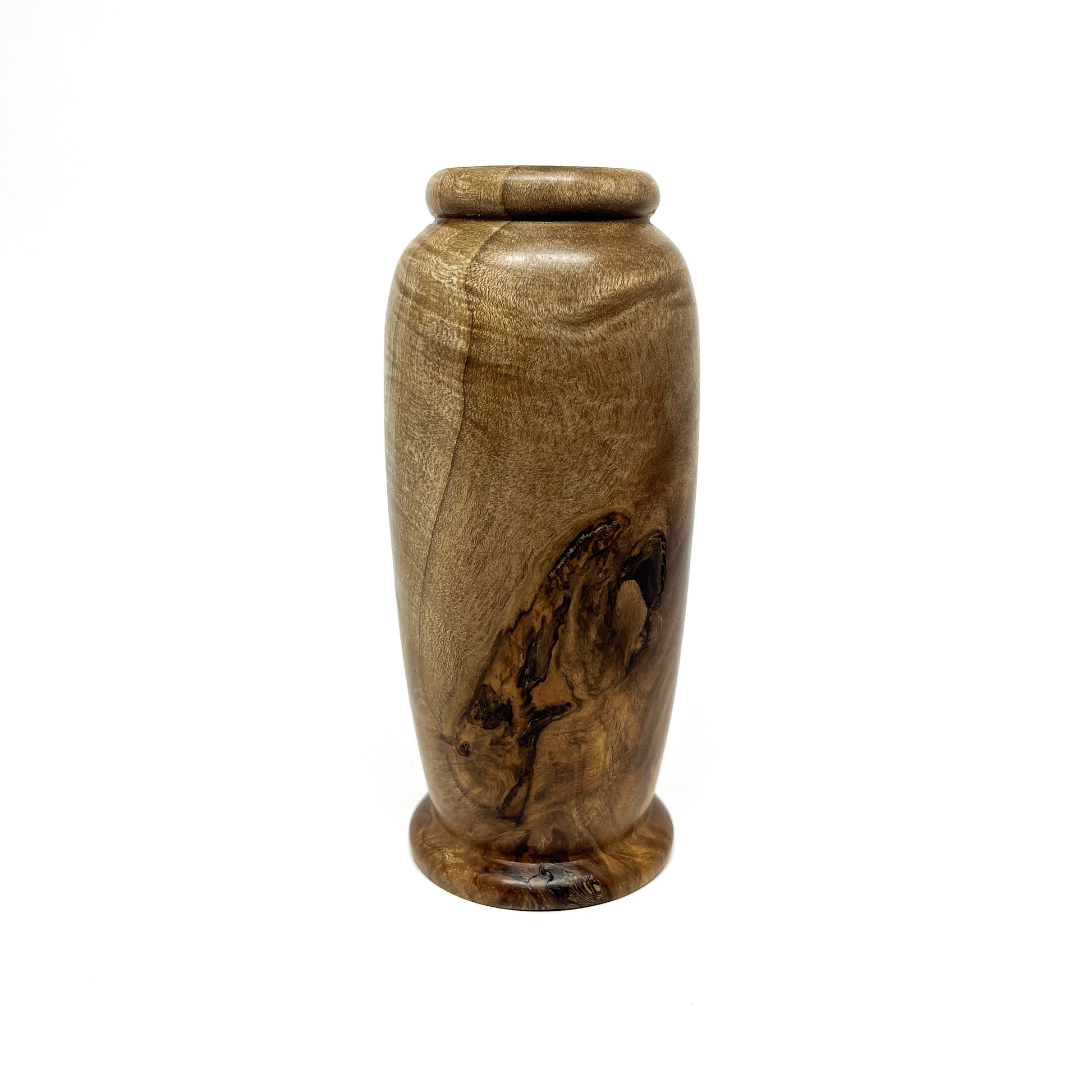 Small wooden vase with a unique, swirling wood grain pattern and a slightly rounded base and top.