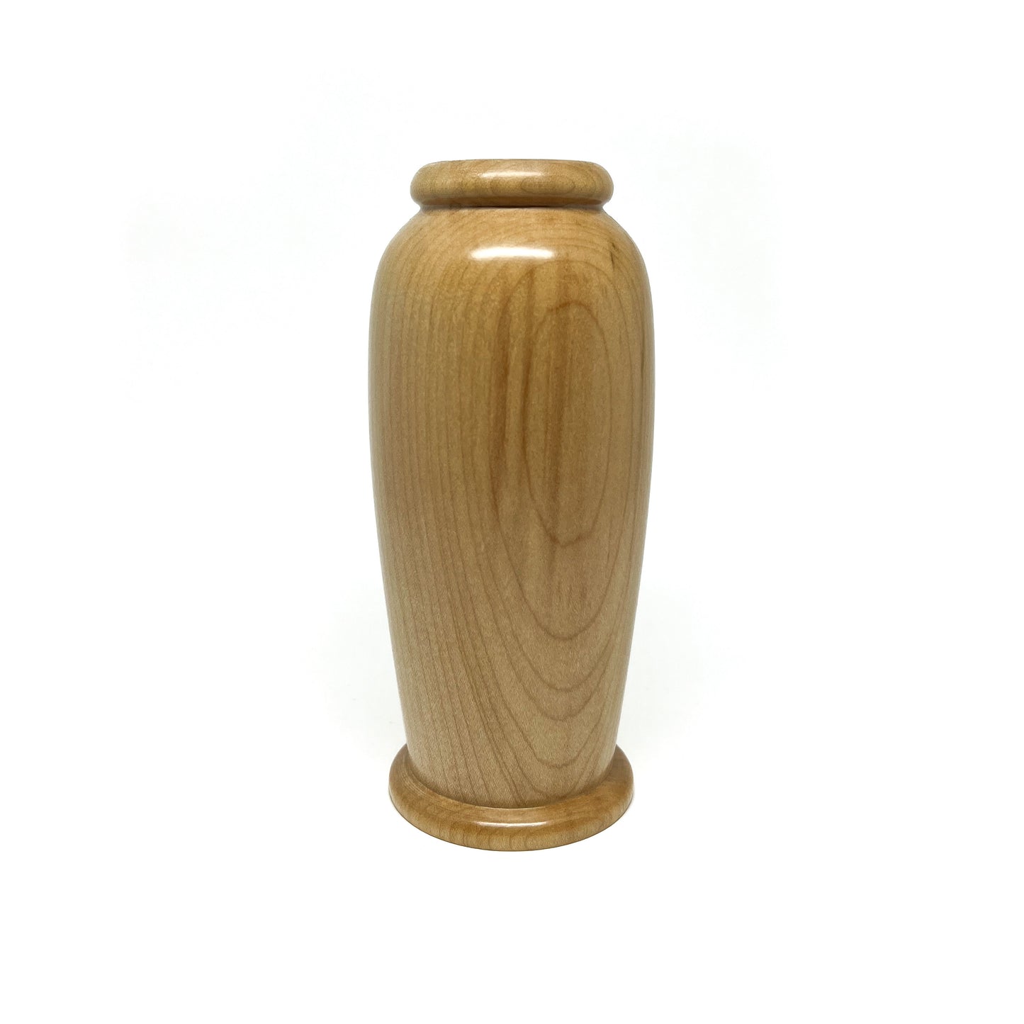 Small, smooth wooden urn with a simple, elegant form and subtle vertical wood grain.
