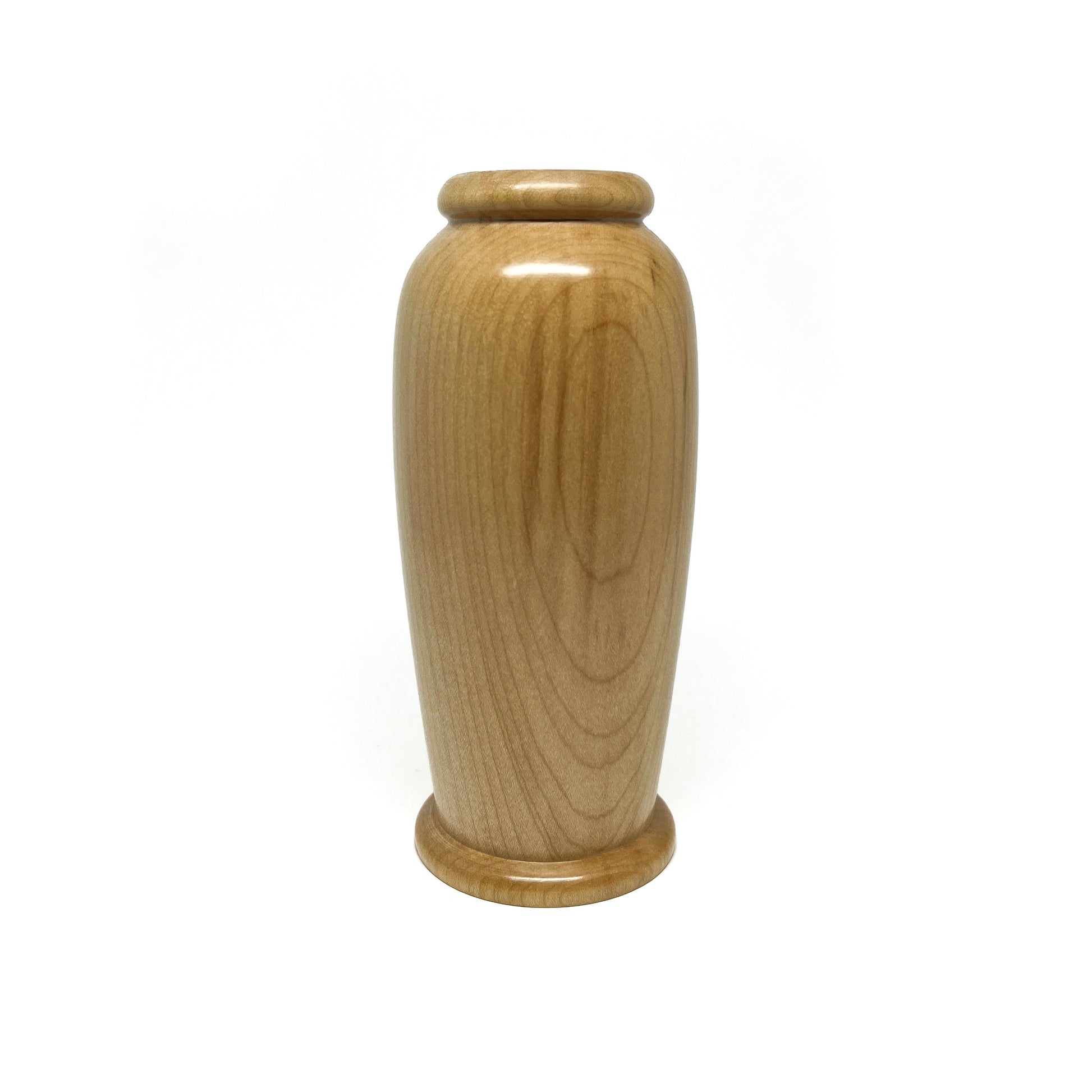 Small, smooth wooden urn with a simple, elegant form and subtle vertical wood grain.
