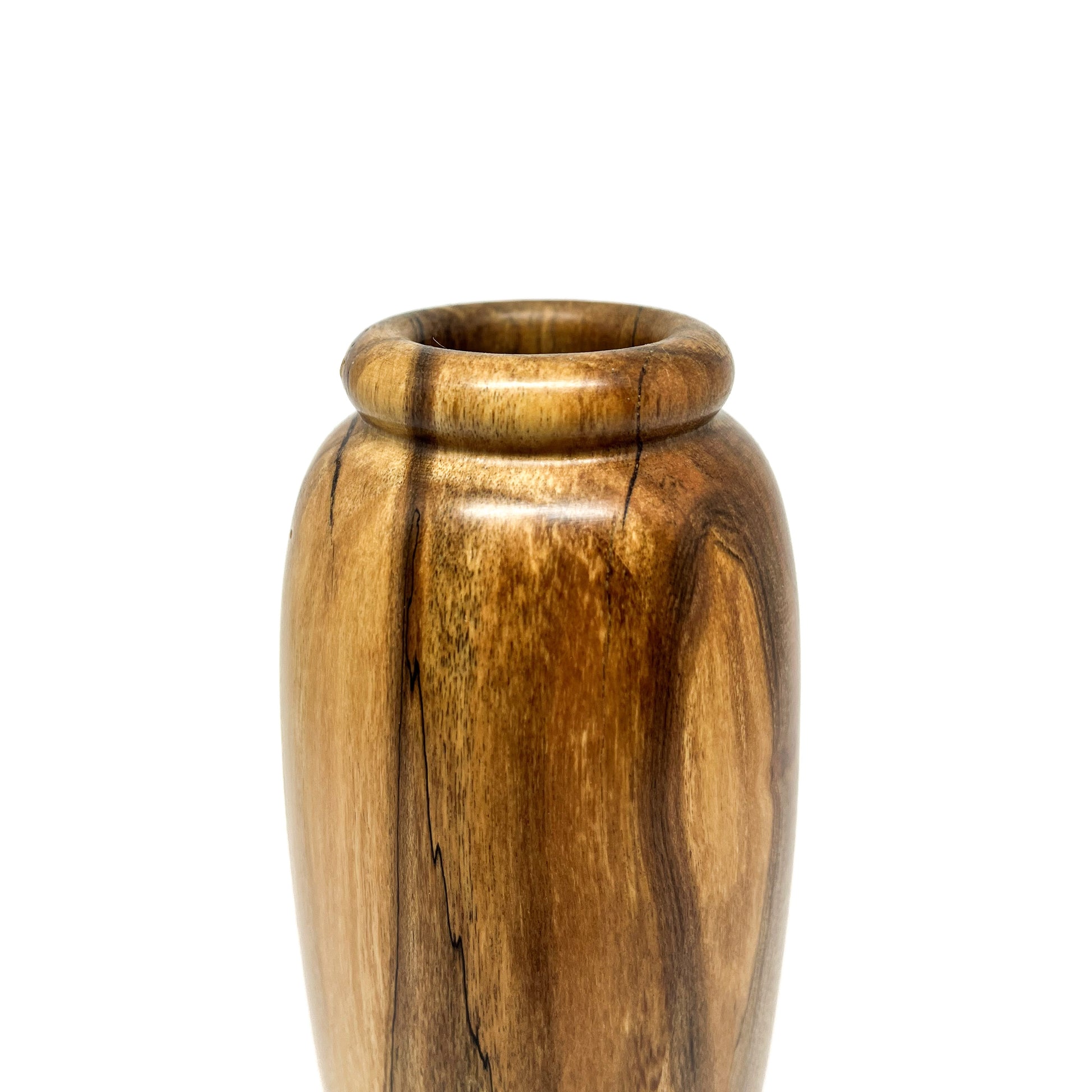 Close-up of a wooden vase showing the natural wood grain and the curved opening with a rounded rim.
