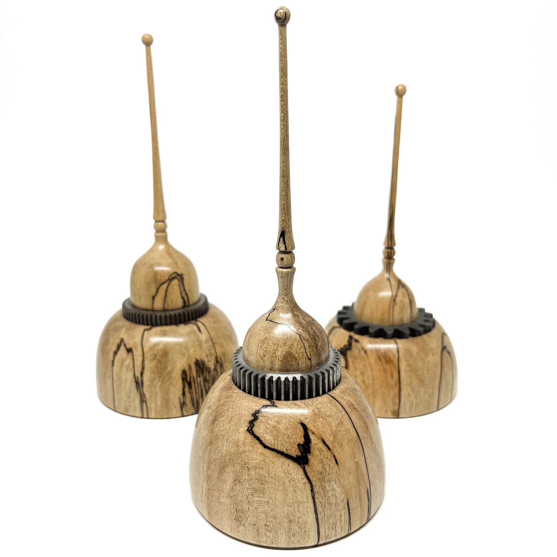 Three small wood spire sculptures by David Adolph, each with unique spalted maple and textured rings.
