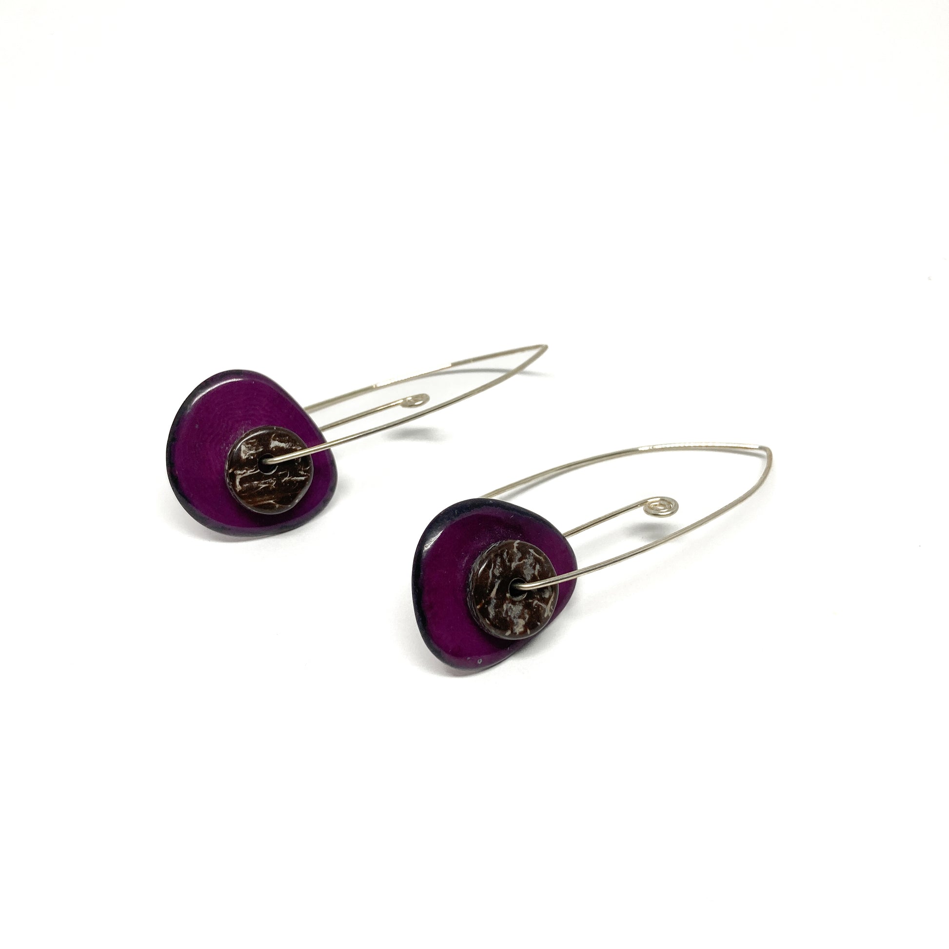 Two purple earrings with silver pins and round metal details.