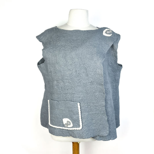 Gray Merino Wool Vest with Cotton Yarn Detail and a pocket with decorative stitching and button.