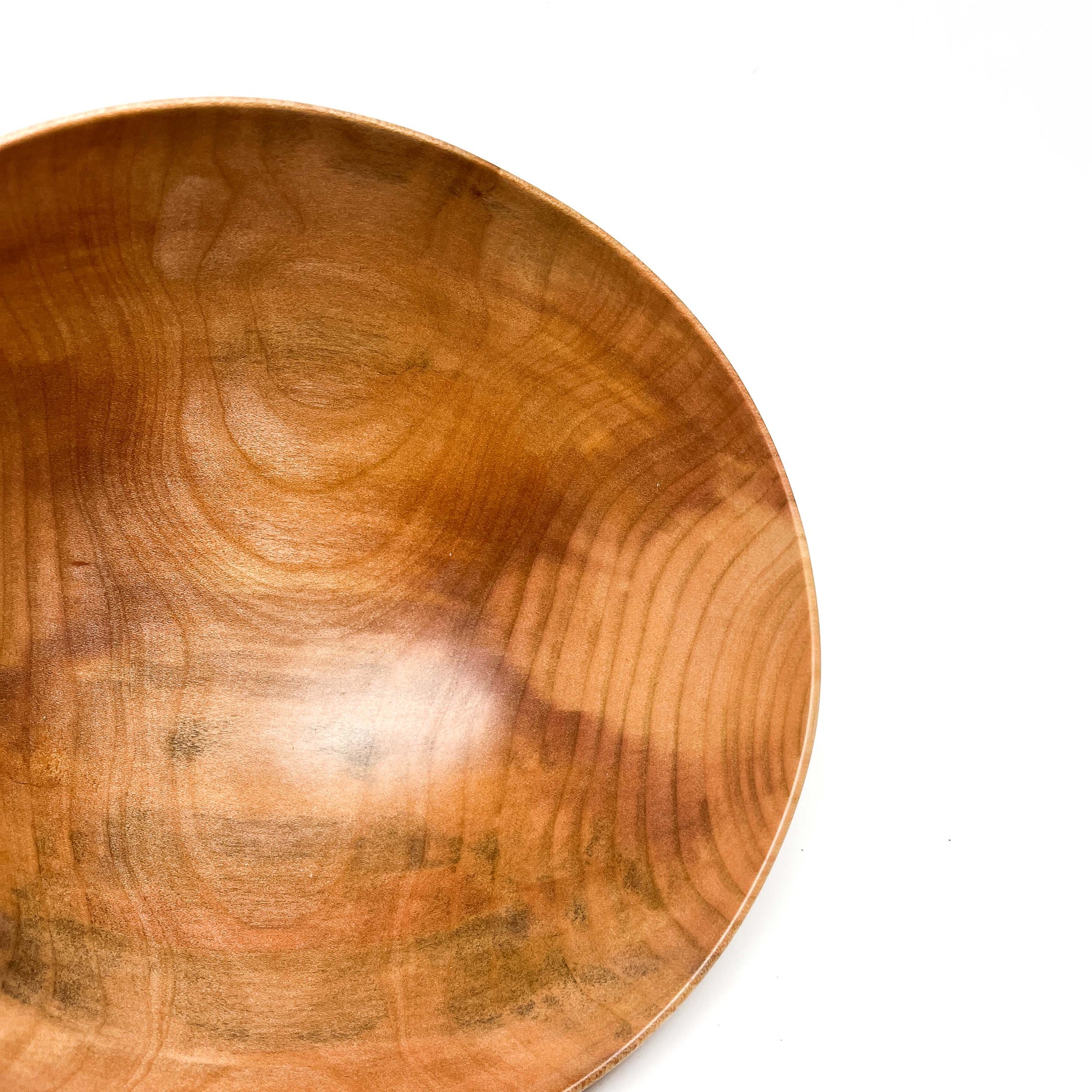 Close-up of the interior of a wooden Pink Dogwood Bowl showing the grain.
