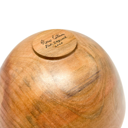 Bottom of a Pink Dogwood Bowl showing the artist's signature and "2024".