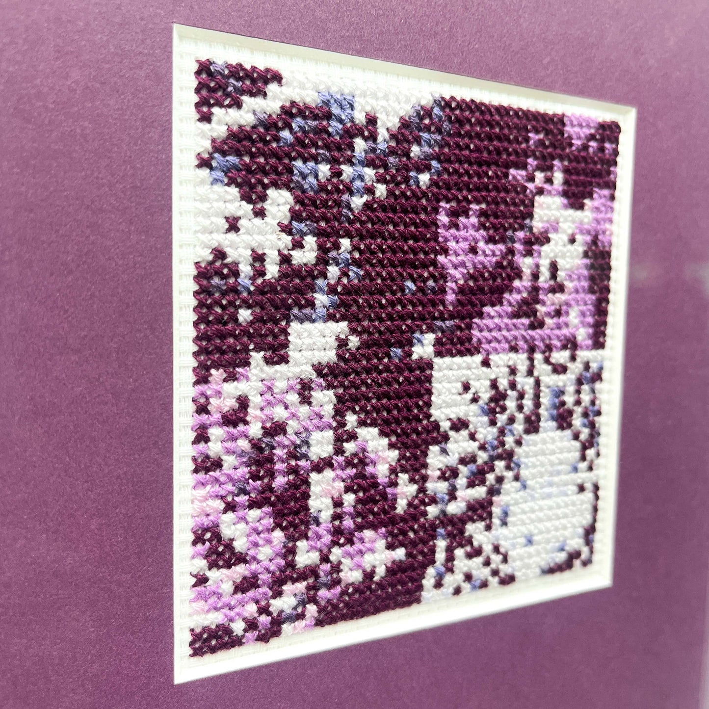 Detail shot of the stitched texture and pattern in the “Purple Monochrome” artwork.