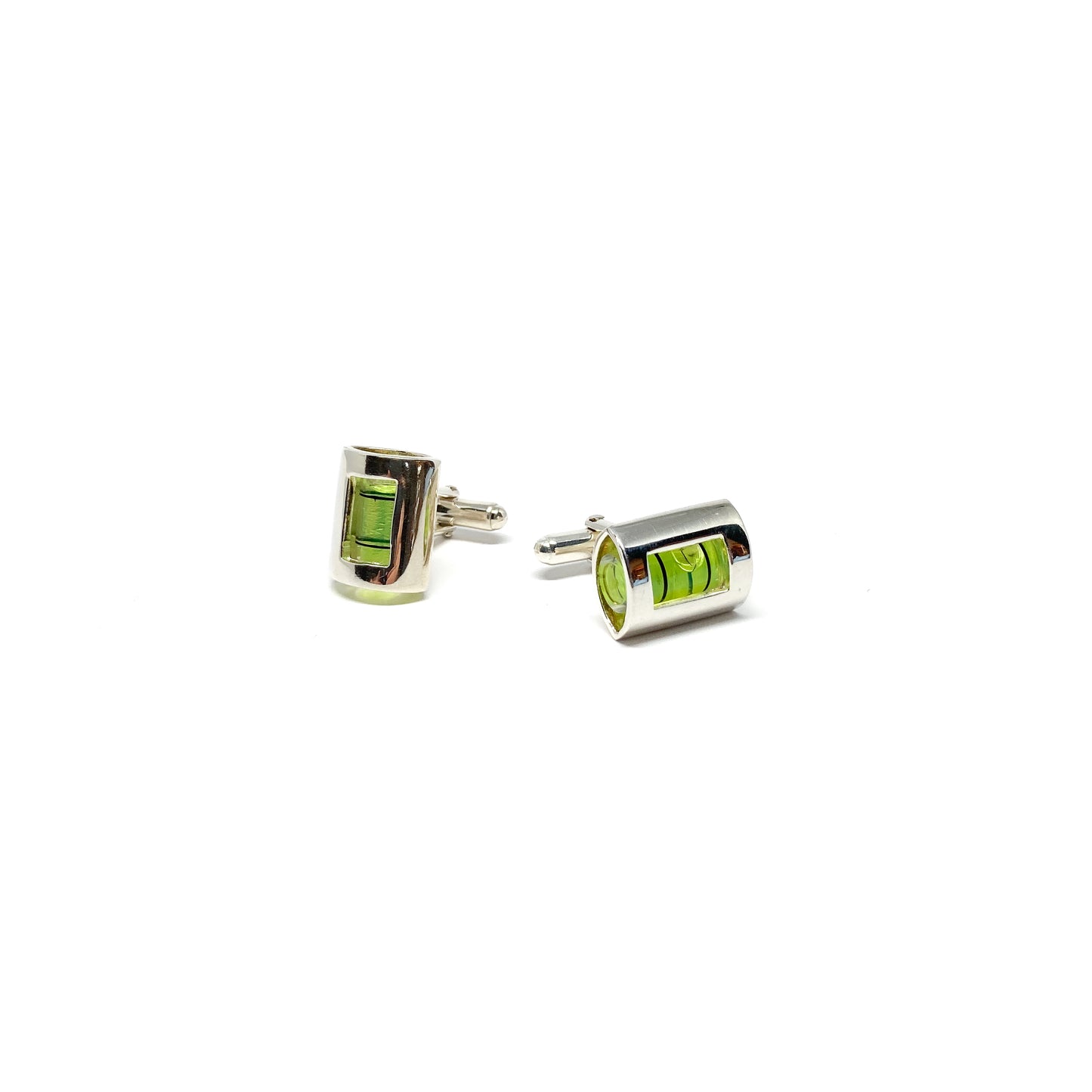 A pair of silver-toned MRCUFF Level Green Liquid Construction Cufflinks with miniature spirit levels containing bright green liquid and air bubbles.