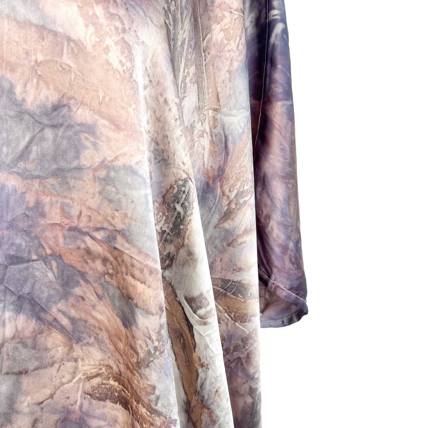 Detail of the Short Silk Cardigan sleeve and body highlighting natural dye effects and soft drape.