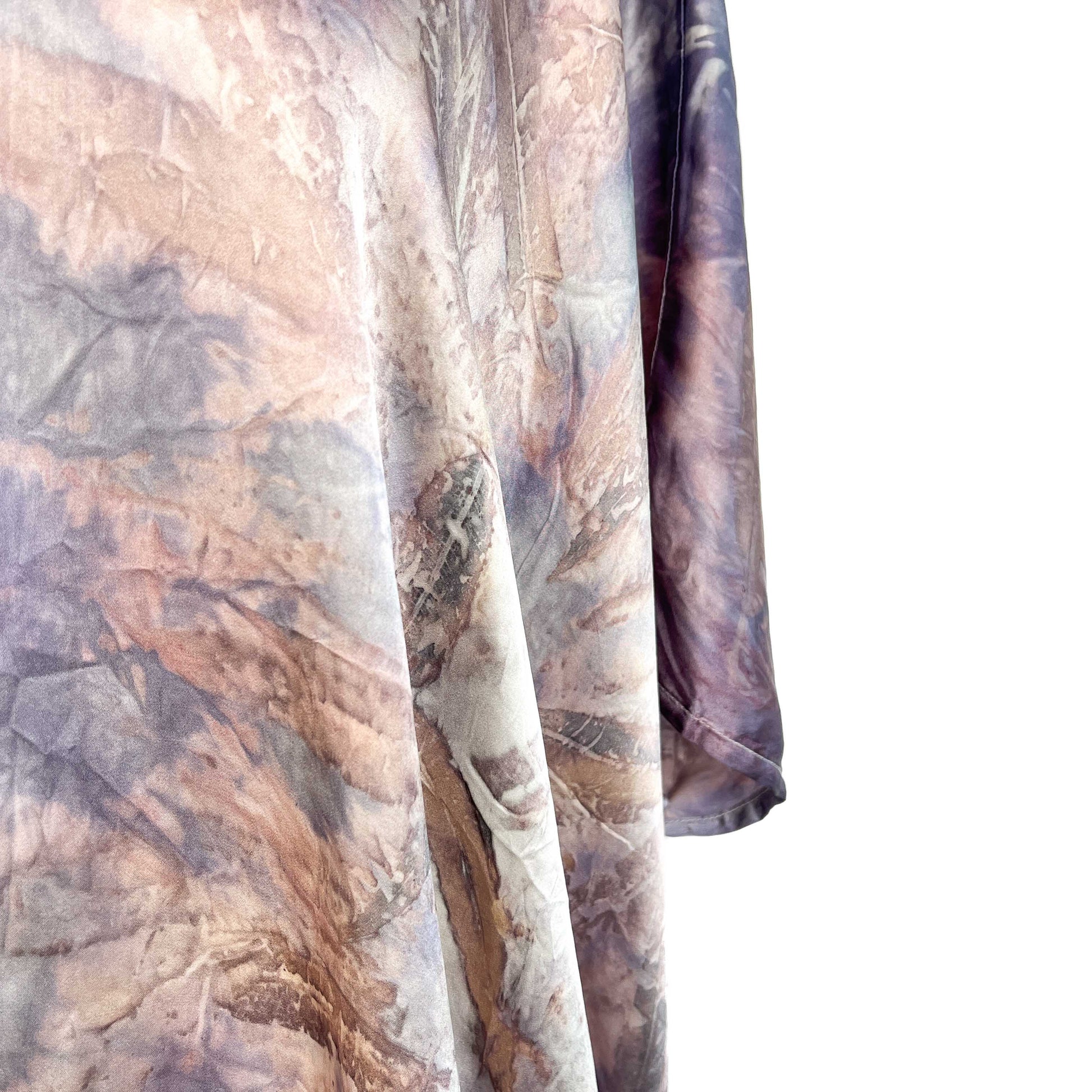 Detail of the Short Silk Cardigan sleeve and body highlighting natural dye effects and soft drape.