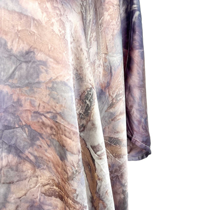 Detail of the Short Silk Cardigan sleeve and body highlighting natural dye effects and soft drape.