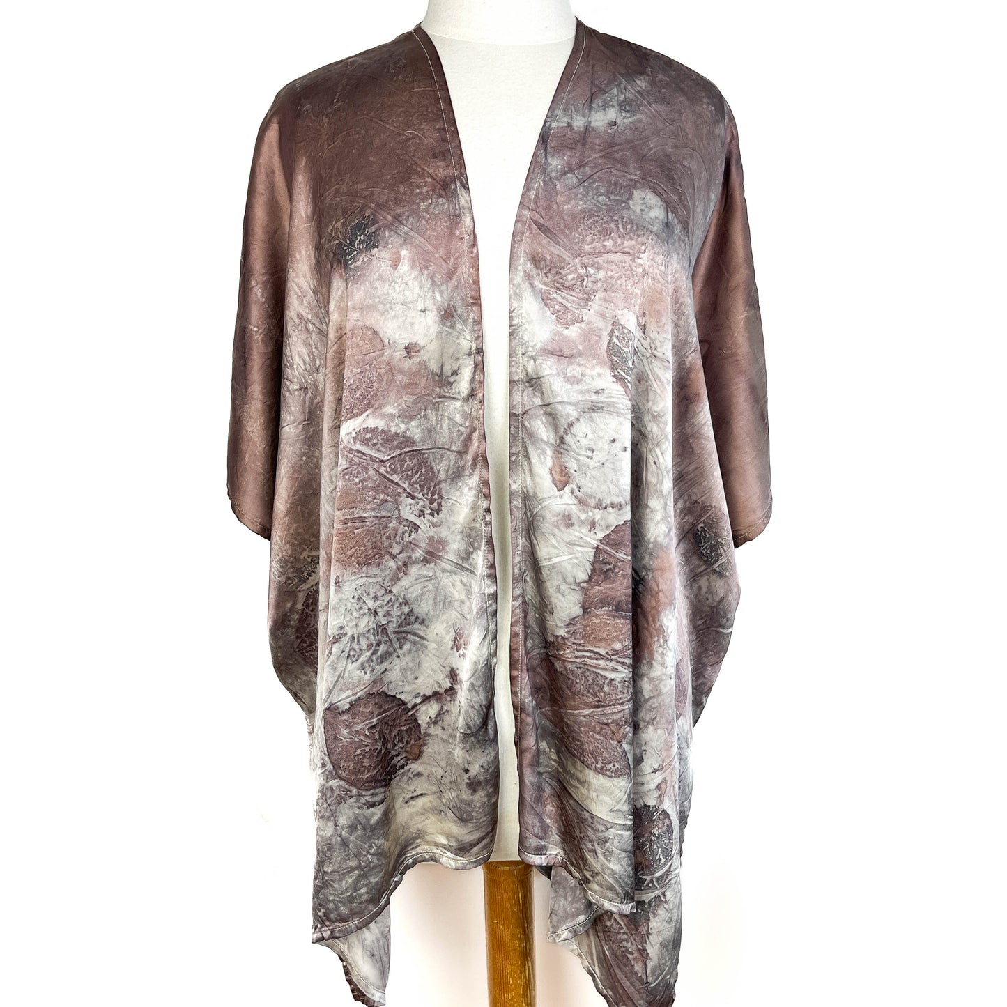 Front view of Short Silk Cardigan in abstract botanical pattern with a free-flowing, lightweight design.