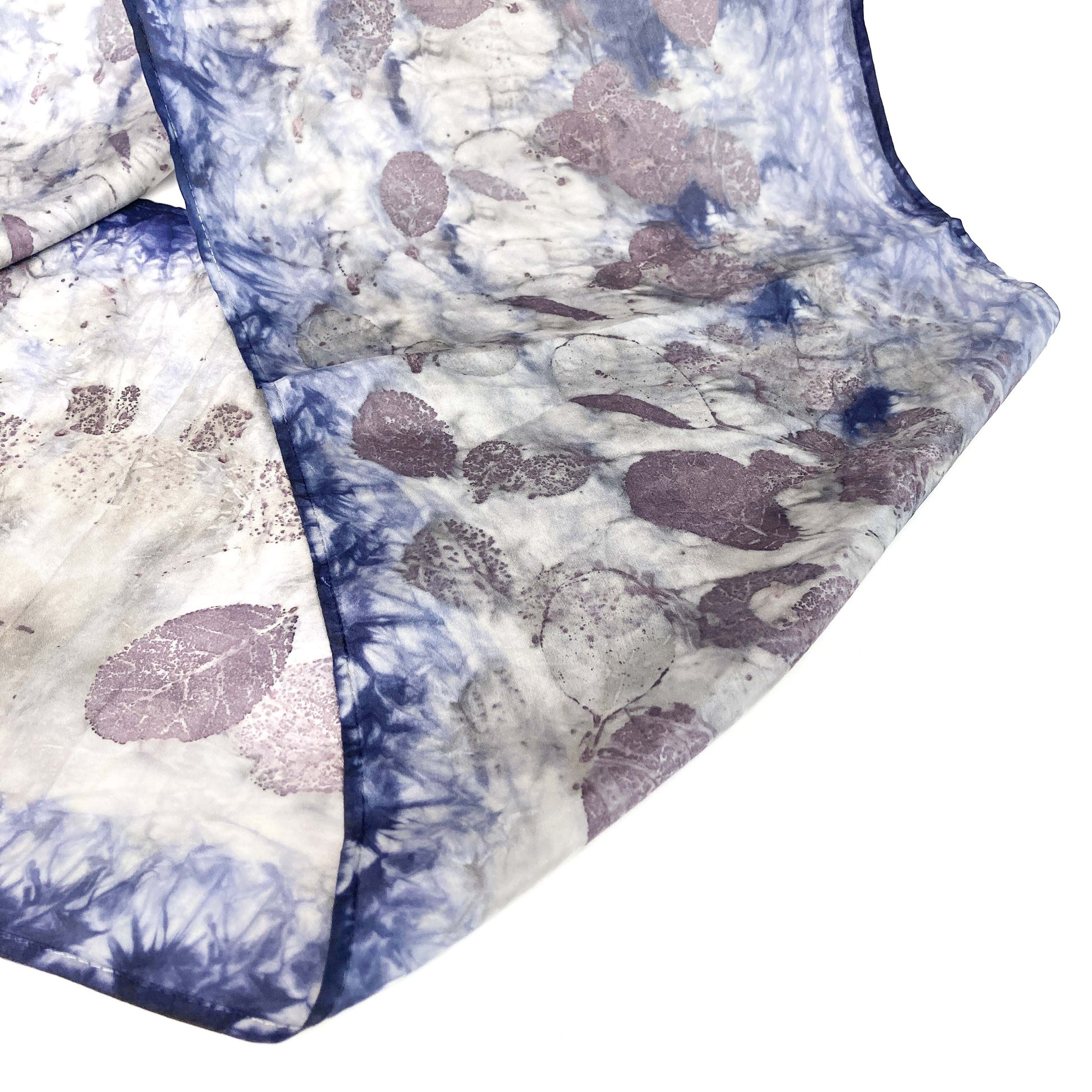 Silk Habotai Infinity Scarf with a leaf print and a soft, flowing drape.