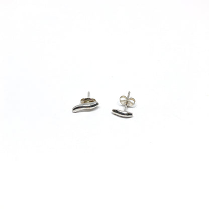 Silver organic stud earrings.