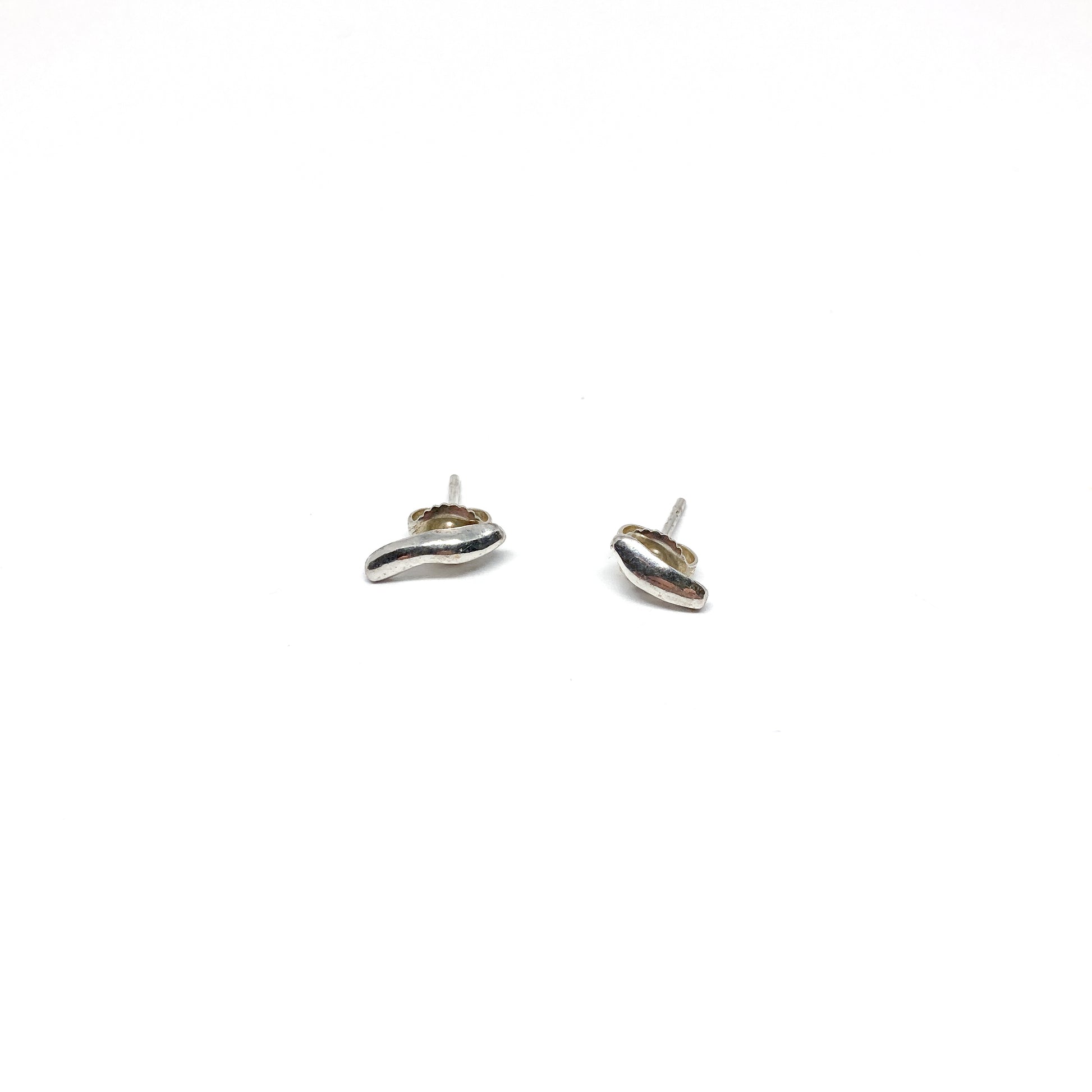  Silver organic stud earrings.