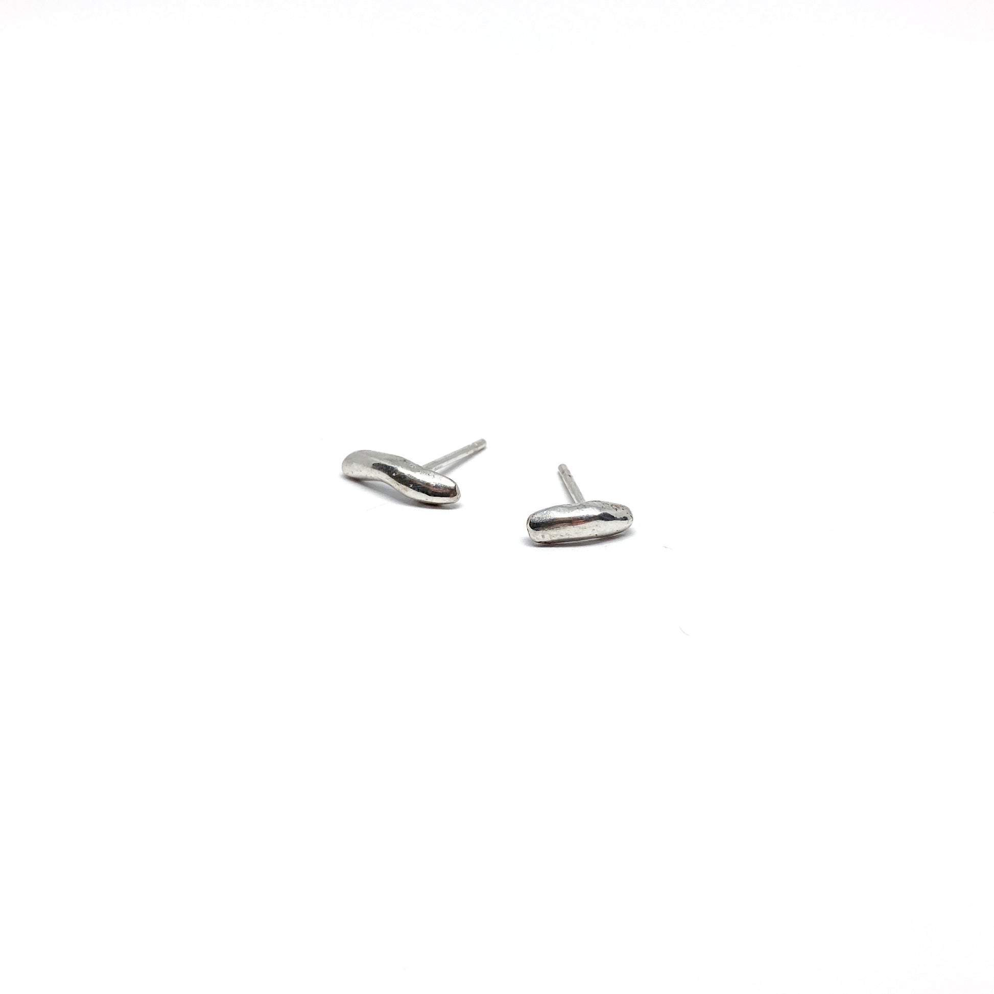  Silver organic stud earrings.