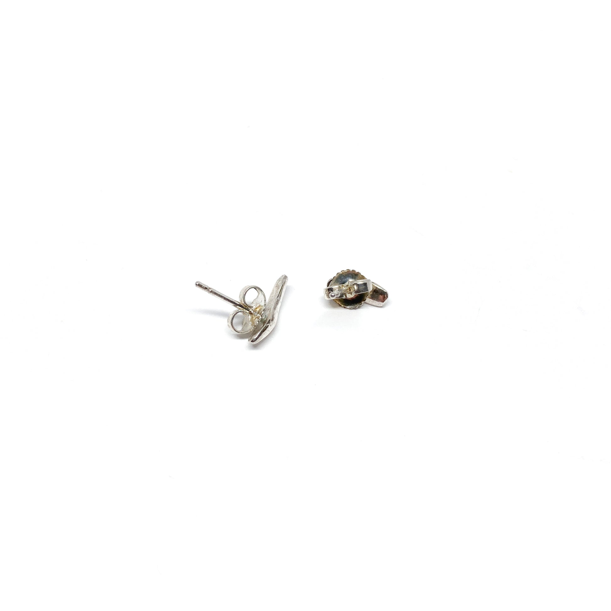  Silver organic stud earrings.