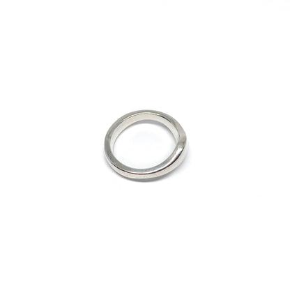 Modern silver ring with a smooth, curved design.