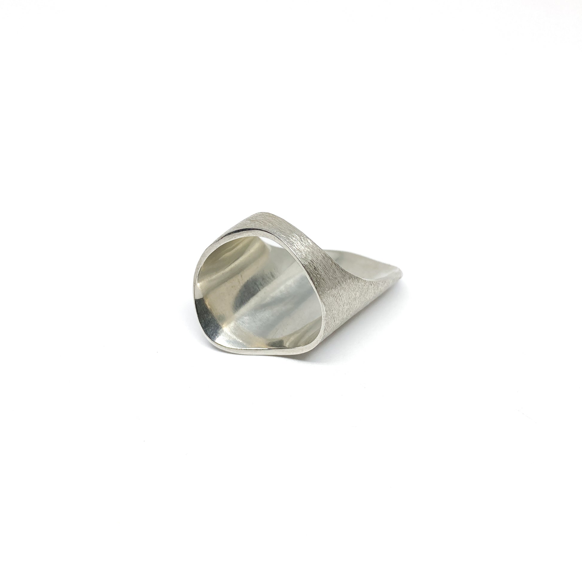 Silver ring, textured.
