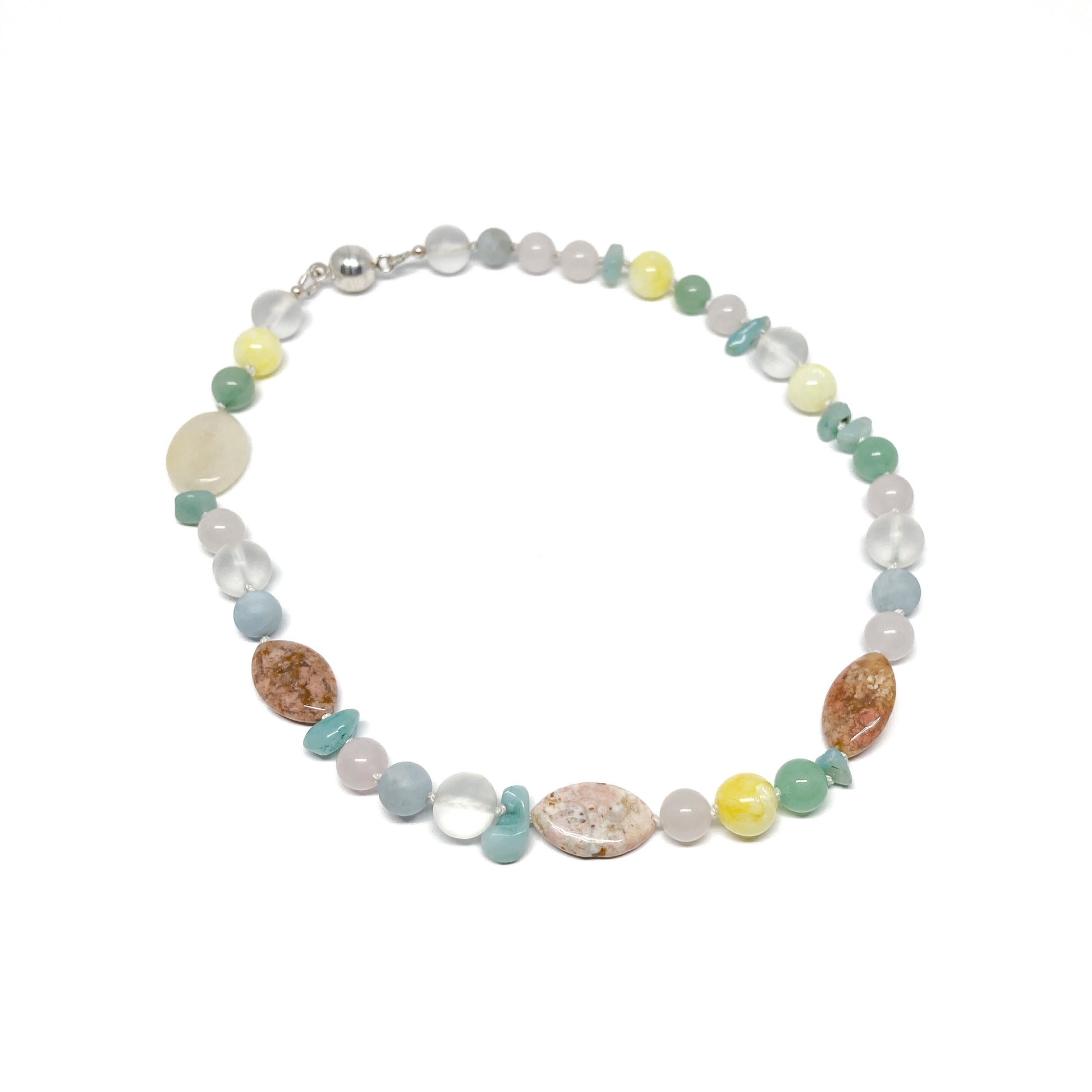 Pastel beaded necklace with various stones.