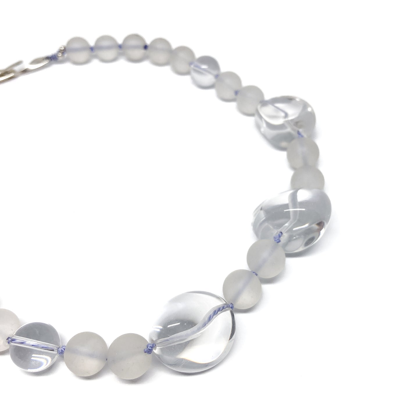 Clear quartz necklace close up.