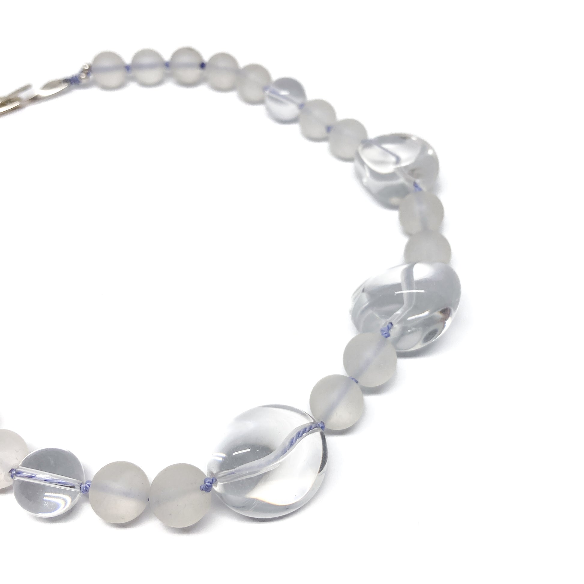 Clear quartz necklace close up.
